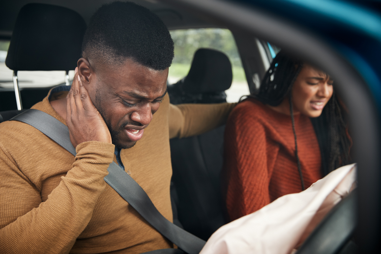 What Causes Neck and Lower Back Pain After a Car Accident?